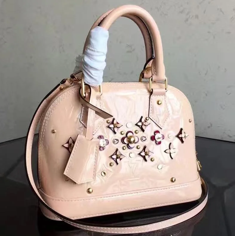 Louis Vuitton Capucines bags with smooth calfskin leather for luxuryLouis Vuitton Alma BB Tote Bag Monogram Vernis Rose Ballerine