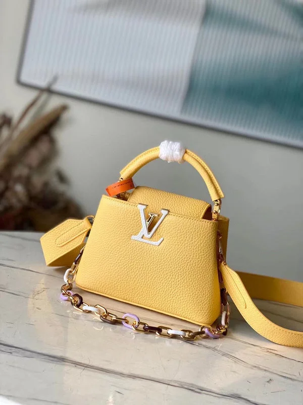 Louis Vuitton Twist bags with a crystal - embellished LV - turnlockLouis Vuitton Bags