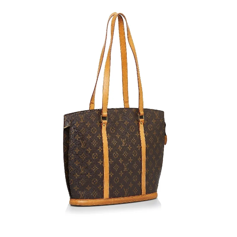 Louis Vuitton Alma bags featuring the signature top - handle designLouis Vuitton Babylone Monogram Canvas