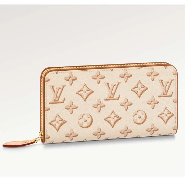 Louis Vuitton Twist bags with a contrast - colored interior for visual interestLouis Vuitton LV Unisex Zippy Wallet Beige Monogram Coated Canvas Calf Leather