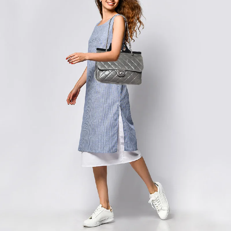 Chanel bags with the perfect balance of luxury and functionalityCHANEL Grey Quilted Glazed Leather Small CC Delivery Bag