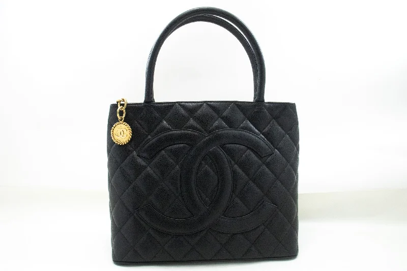 Chanel bags in luxury boutiques worldwideCHANEL Gold Medallion Caviar Shoulder Bag Grand Shopping Tote Bk